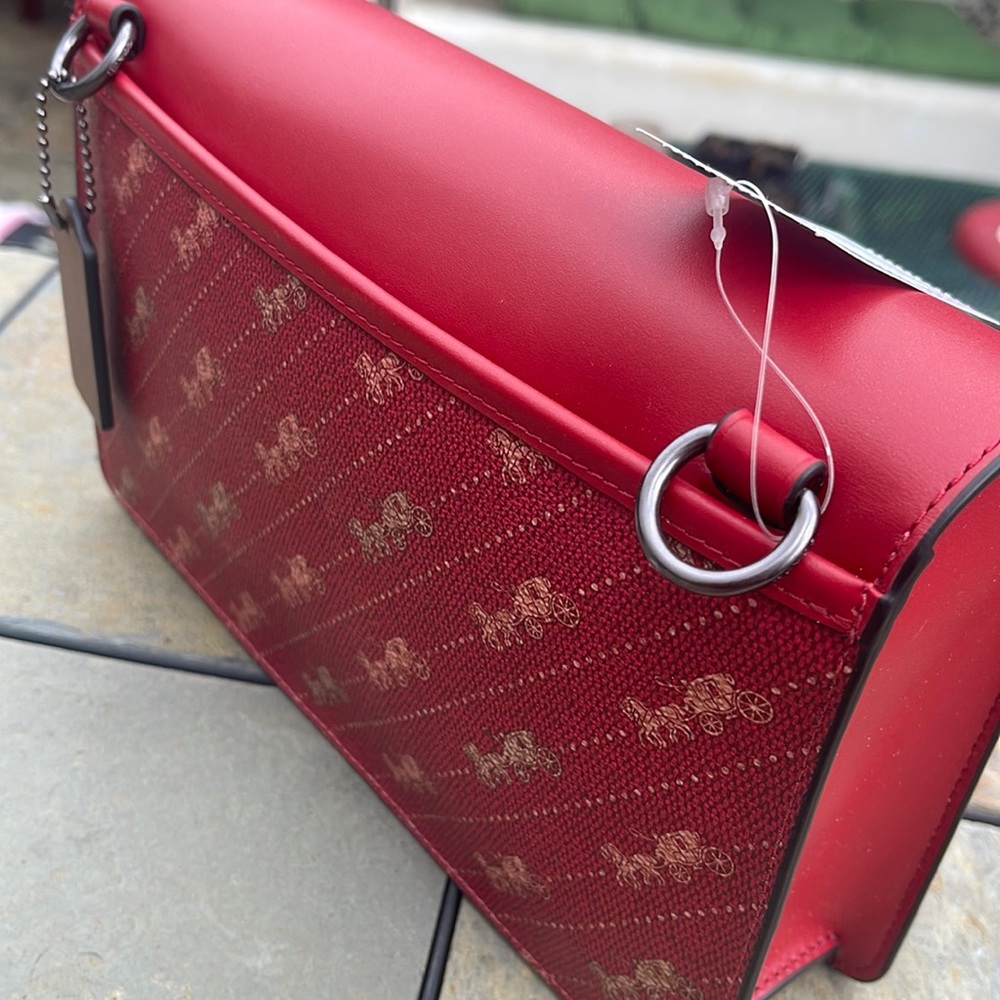 Coach Womens Clutch. Or Strap. Brand new with Tags, you never used!